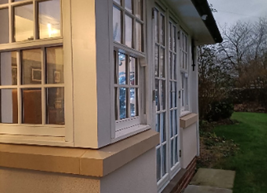 Rendered glass extension and exterior building work